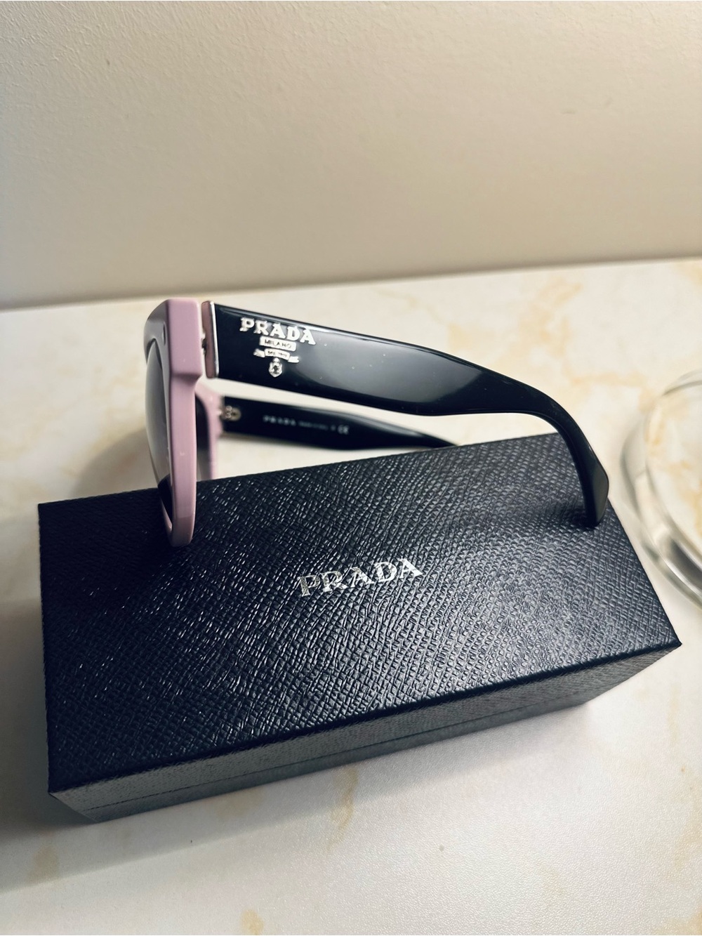 Very unique and distinctive Prada sunglasses with a statement-making design. - Picture 2 of 9